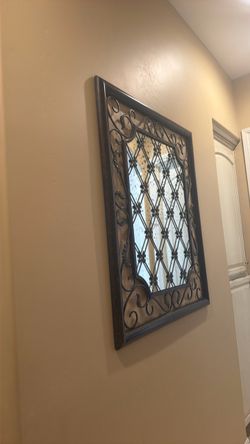 Large four-de-lis mirror