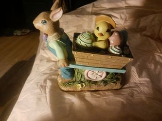 Vintage Easter rabbit pushing a cart