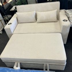Beige corduroy convertible sofa with sleeper bed with cup holders 