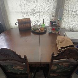 Dinning room table with twin chairs