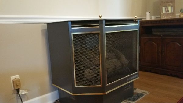 Free Standing Heat Master Gas Stove With Fire Logs Purchased From