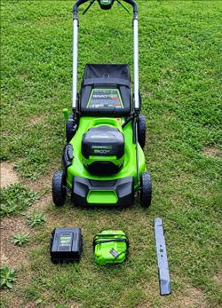 Never Used Greenworks 60v 21" Cordless Self-propelled Lawn Mower (Retail $700) has one 4ah batteries
