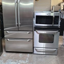 Refrigerator Ge Monogram 4 Door,  Stove Electric And Microwave In Stainless Steel Combo Delevery 