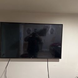 56” Lg Tv  Wall Mount Included 