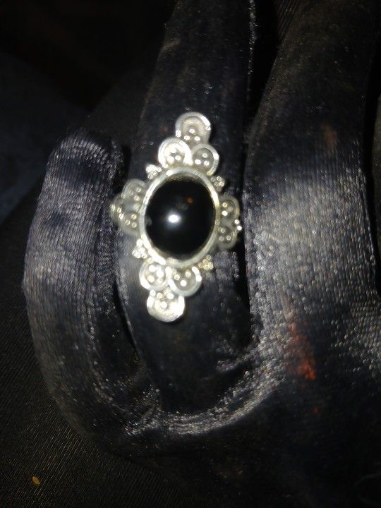 Silver ring with black onyx like stone