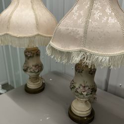 Lovely pair of mid-century floral pattern, porcelain lamps with fringe shades
