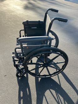 Rhythm Healthcare Wheelchair with Left Elevating Legrest