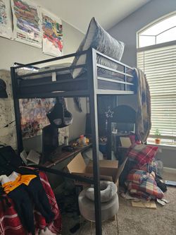 Twin size bunk bed with desk