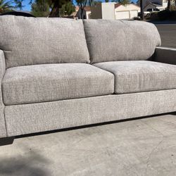 New Loveseat By Ashley 