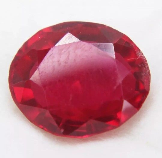 Rare 4.30 Ct  Loose Myanmar Red Ruby Like Corundum Heated Oval Cut. This rare 4.30 Ct  loose Myanmar Red Ruby Like Corundum Heated Oval Cut is a stunn