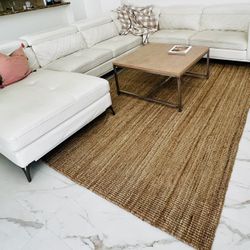 Sectional,Coffee Table And Rug.  