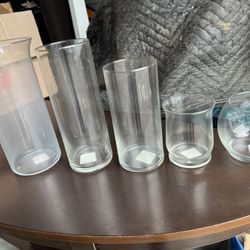 An Assortment of Clear Glass Vases . Can Be Used For Centerpieces At Wedding , Graduation, Any Occasion. 120 Of Each Vase Available @ $3 Dollars Each