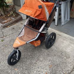 BOB Revolution SE Jogging Stroller – Orange/Brown – Excellent Condition