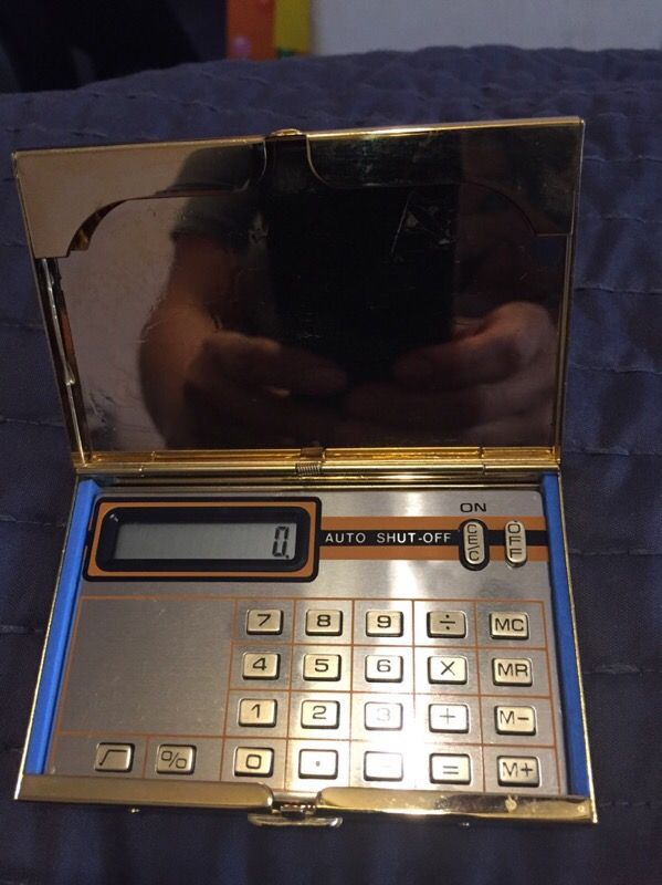 Calculator and card holder