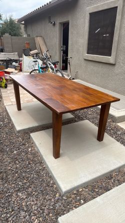 Crate and barrel solid wood table