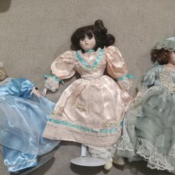 Set Of 3 Porcelain Dolls 