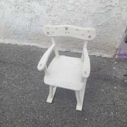 A Small Rocking Chair That Needs A Touch Up Great For Pictures