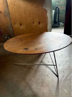 Room & board round brown coffee table