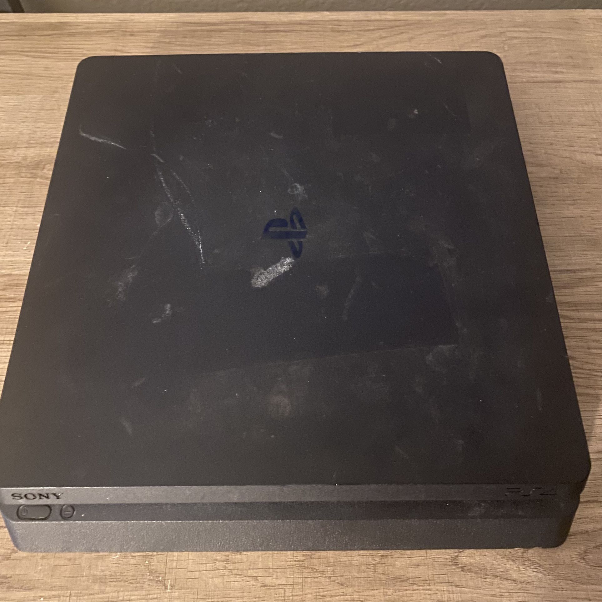 PS4 Slim With Controller + 4 Games