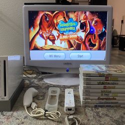 Nintendo white Wii complete tested and working with 10 games ! 