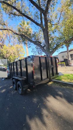 BRAND NEW DESIGN DUMP TRAILER 12x8x4 12,000 LBS ROLLING TARP AND SPARE TIRE HYDRAULIC SYSTEM ELECTRIC BRAKES TITLE IN HAND FOR ANY QUESTION TEXT ME PL