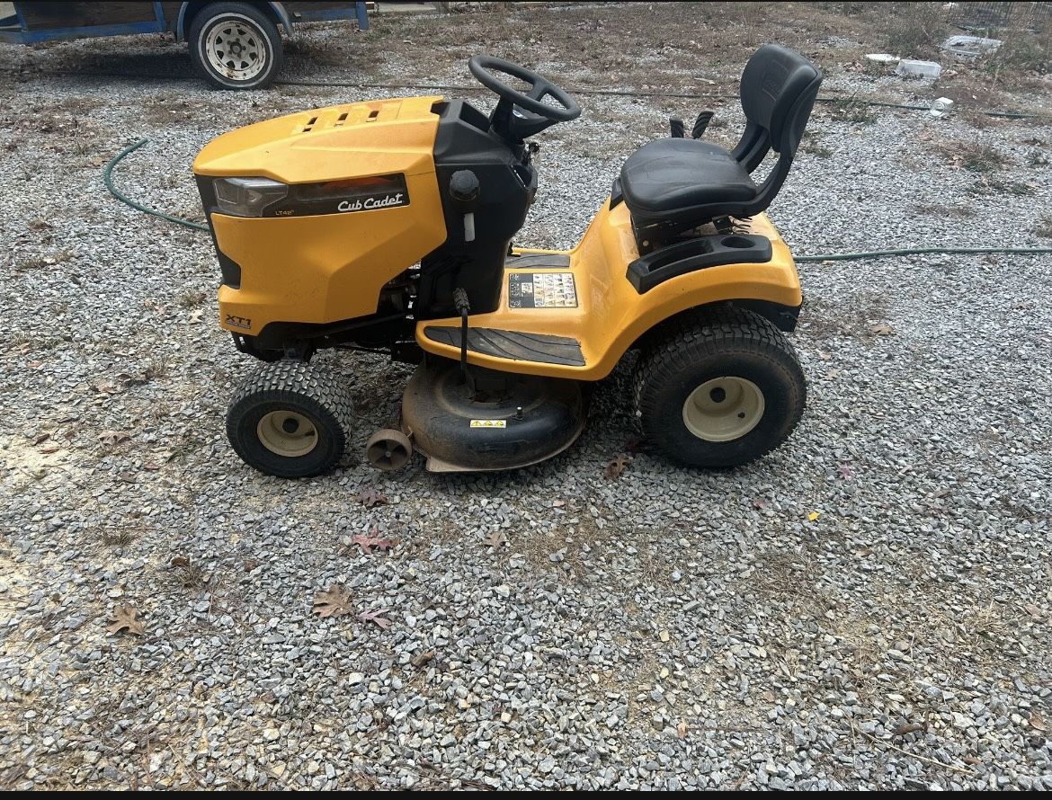 Cub Cadet Mower With Dump Cart. $1000.00 O.B.O