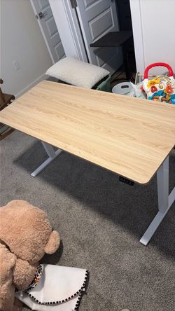 Self rising desk
