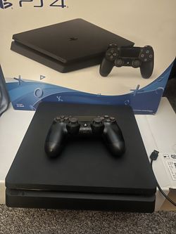 PlayStation 4 1TB, W/ a controller and extended charger