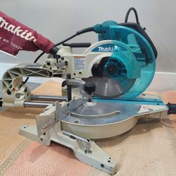 Like New Makita LS1013FL Dual slide compound miter saw 10" blade, Left / right bevele