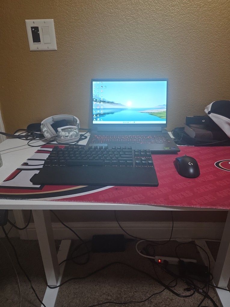 Dell G15 Gaming Laptop With A 4069 With A Intel Core 17 Laptop With A Apex Pro Tkl And A Gpro Superlight