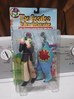 2000 The Beatles Yellow submarine Paul with the Sucking Monster McFarlane.   New. Collectible.