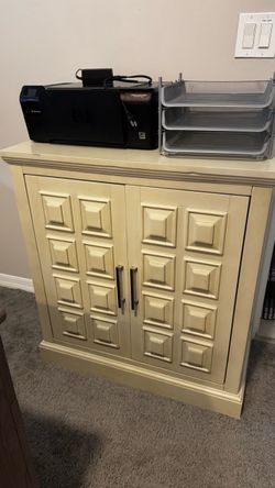Cream Wood Cabinet with Raised Panel Doors