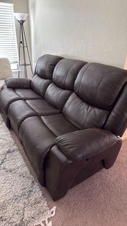 Leather couch w/ power recliner ends!