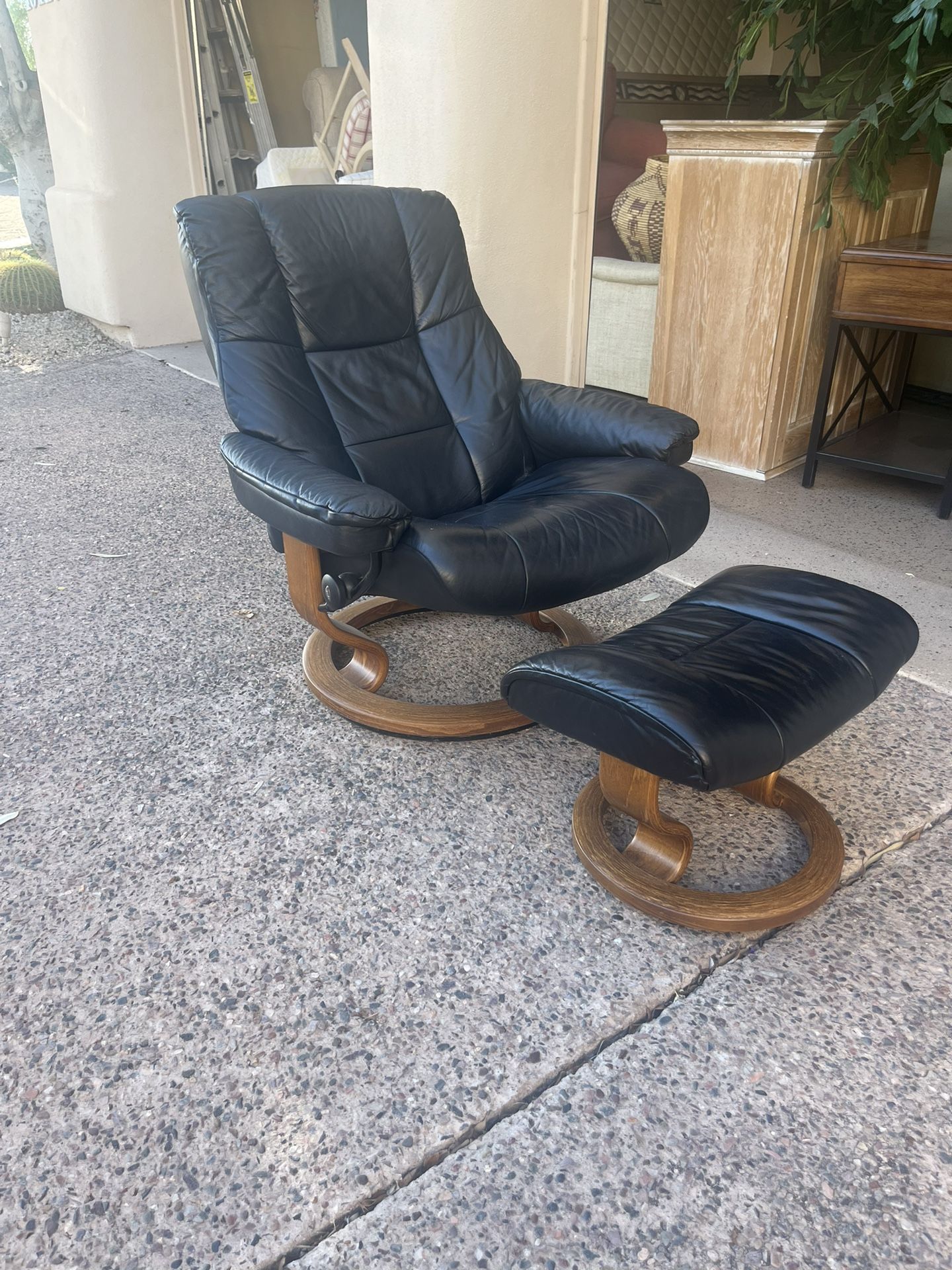 Two matching, beautiful Ekornes Stressless Leather Recliners with Ottomans for sale.