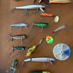 Fishing lures, $6 each some collectible heddon one is wood? but repainted rough condition