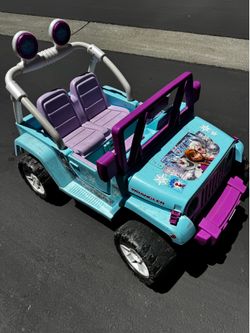PowerWheels Disney Frozen Jeep Wrangler 12V Battery Powered Ride On Ages 3+ Used Good condition.