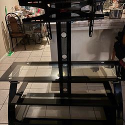 T.V Stand Holds Up To A 50” T.V  In Great Shape