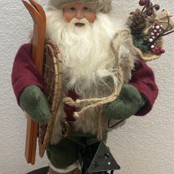 Santa Claus With Skis, Gift Bag And Lantern