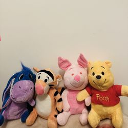 Winnie The Pooh, Tigger, Piglet, Eeyore stuffed animals