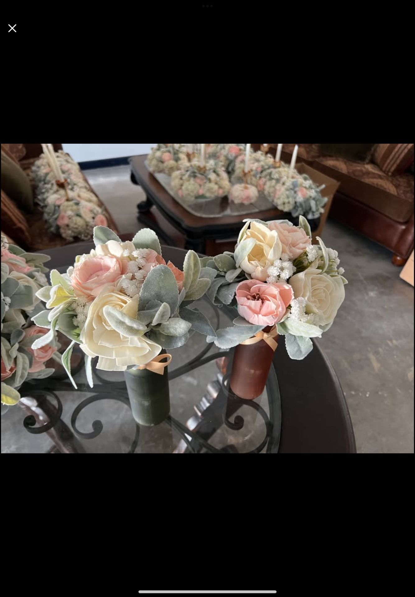 Wedding aisle bouquets and metal arch backdrop stands