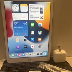Apple iPad AIR 2 64GB WiFi + Cellular unlocked 9.7” iPad—White/Good  complete with usb and Apple Charger In Excellent condition and works great.  IOS 