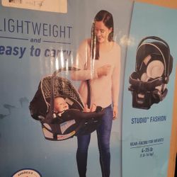 Never Used Snugride 35 Lite LX car seat 