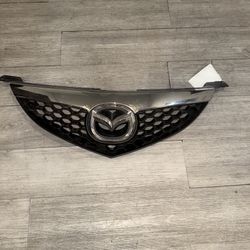 2007-2009 Mazda 3 Sedan Upper Grille W/ Painted Bars & Background Insert OEM