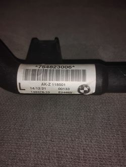 Genuine BMW coolant hose/pipe assembly component (matching part number sequence , often referenced by the barcode/suffix string 06),