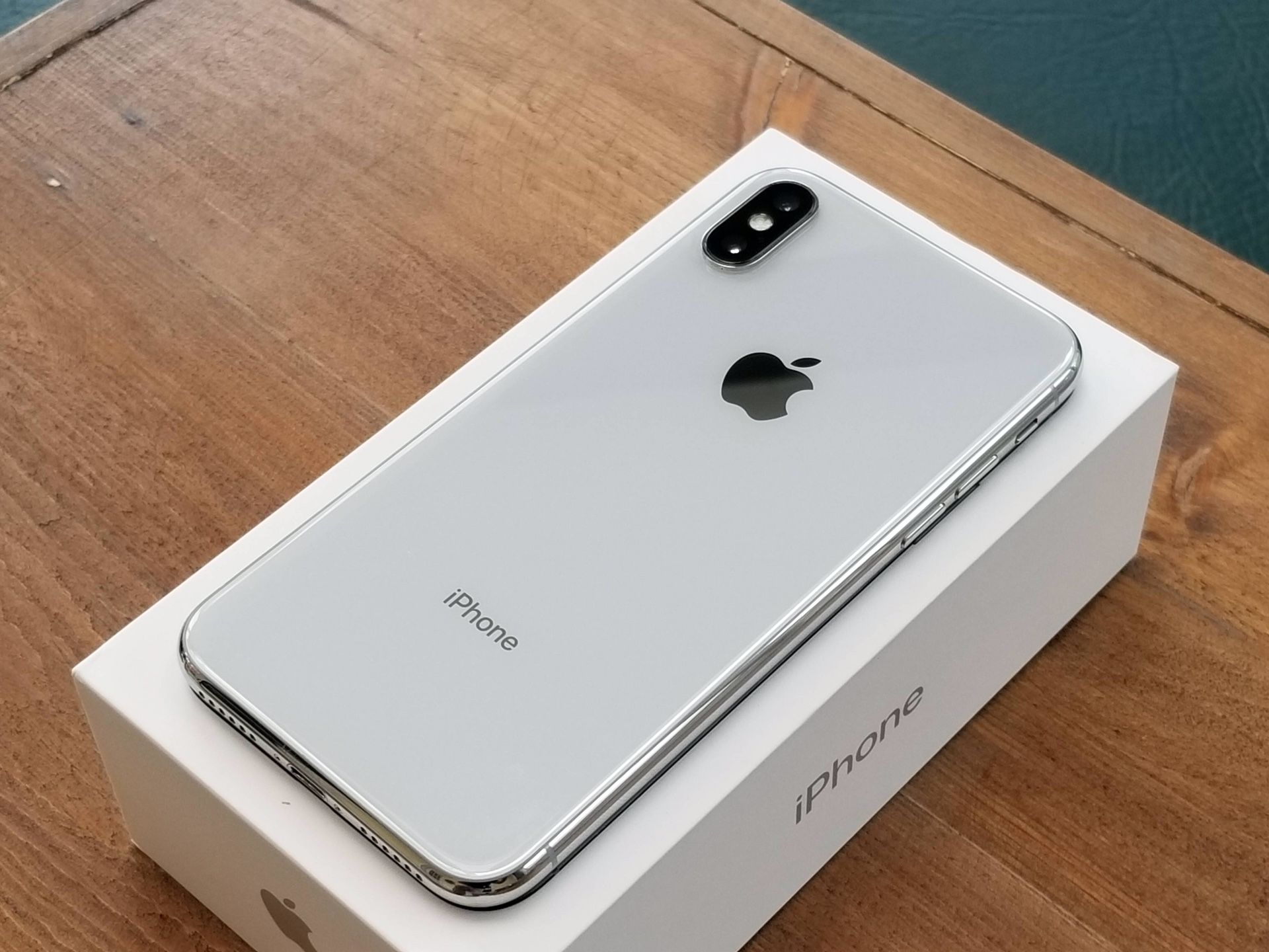 iPhone X with box 400.00 silver