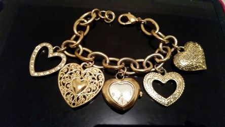 Gold tone Bracelet with Charms