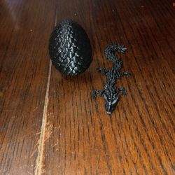 A Black 3D Dragon Toy.