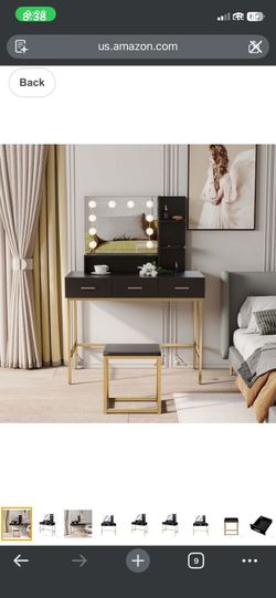 Black and gold vanity with stool
