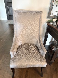 Two light gray velvet high back occasional chairs