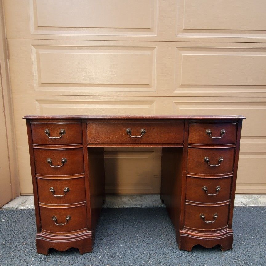 Beautiful Bassett furniture all solid wood work dusk vintage. Antique. Lots of drovers storage space. Only $75 price to sell. Double-sided Desk